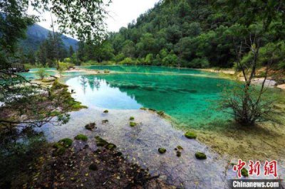 ​九寨沟旅游开发现状 九寨沟旅游业发展史